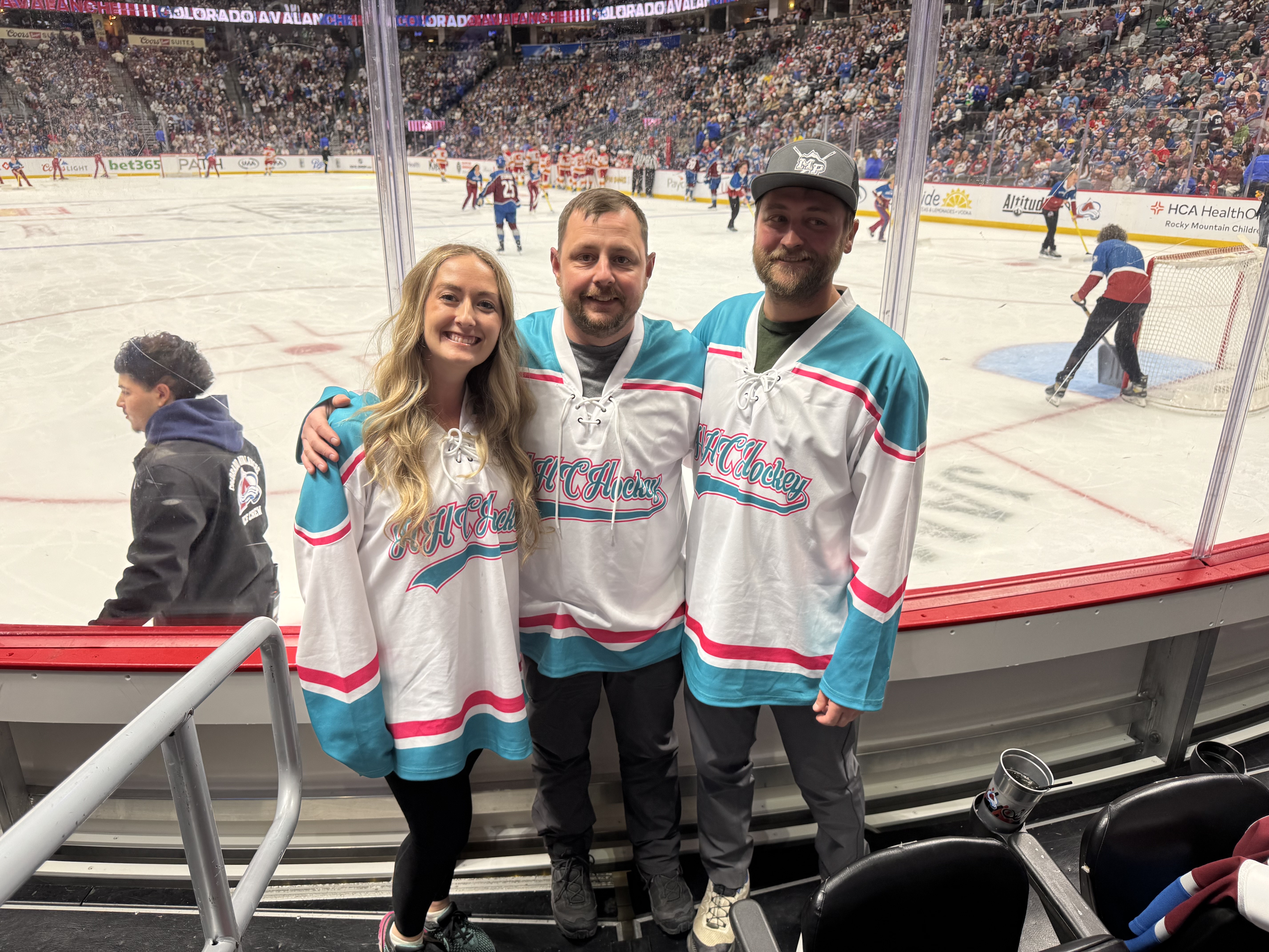 Group at Avalanche game in HHCH jerseys